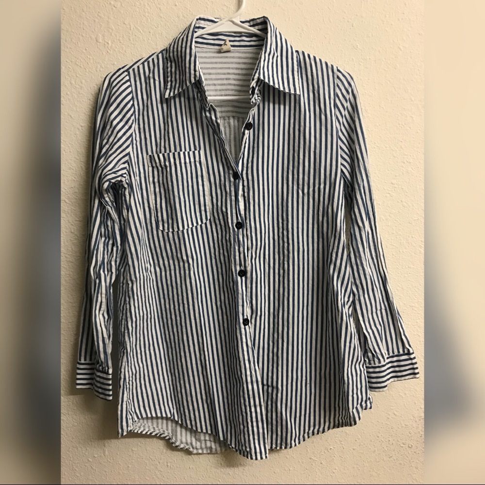 Long sleeved blue and white striped colored shirt